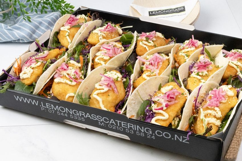 CHICKEN TACO PLATTER - 12 - Crumbed chicken fillets with fresh salad greens, grated cheese, shredded cabbage, carrot, drizzled with mustard mayo sauce & pickled red onion slices in soft tacos - Room temp