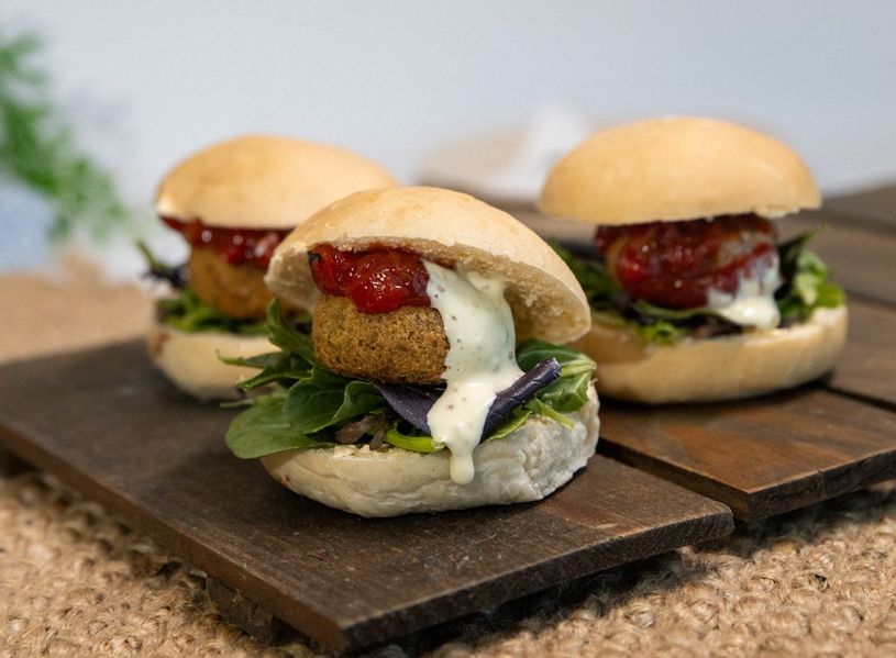 FALAFEL SLIDERS with Chickpea & herb falafel, vegan mayonnaise, relish, salad greens & sliced pickled red onions (VEGETARIAN, DF, VEGAN) 