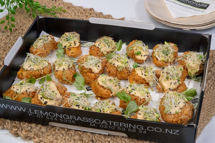 KARAAGE CHICKEN BITES Canape Platter - 20 - topped with katsu sauce, alfa alfa sprouts & black sesame seeds - served cold - Sunday Catering 