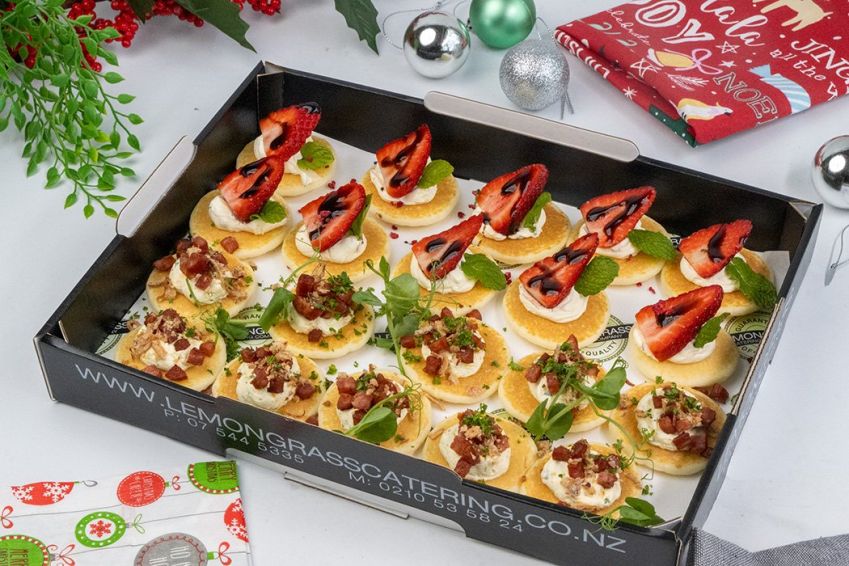 BLINI PLATTER (20) - Summer strawberry, whipped mint cream cheese, balsamic drizzle on blini (10 - vege),   Chorizo crumbles, fried shallots & lemon citrus cream on blinis (10)