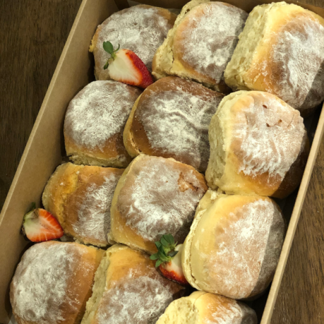 Freshly baked scones with jam & cream