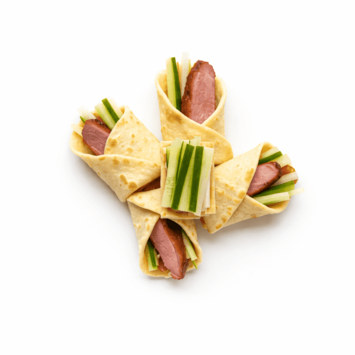 Mini Peking duck pancakes, hoisin sauce, cucumber and shallot