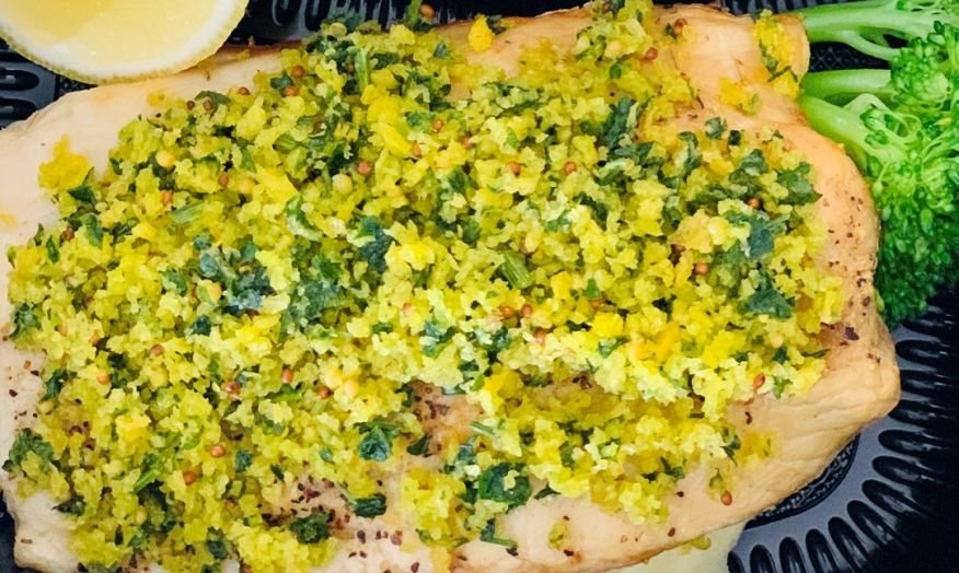 Herb crusted white fish with roasted potatoes and greens