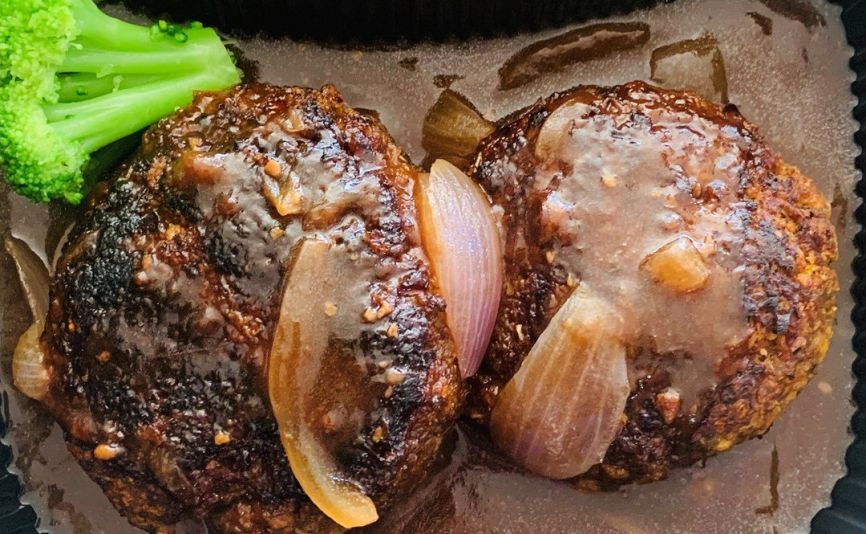Homestyle beef rissoles with mash and fried onions