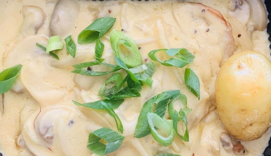 Pork scallopini with roasted potatoes and greens