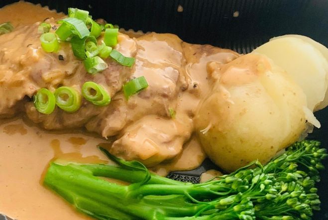 Steak Dianne with boiled potatoes and Greens