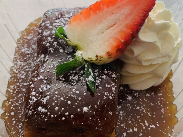 Sticky date pudding with butterscotch sauce and double cream