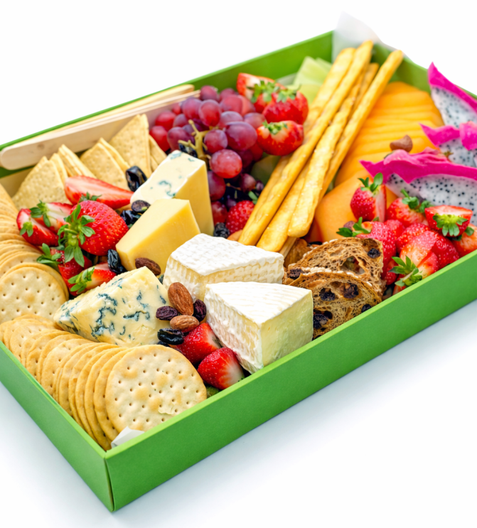 Cheese and Crackers Platter - Grissini, crackers, lavosh, cheddar, brie, Gouda, grapes, strawberries, nuts, dried fruits and rustic crisp bread.