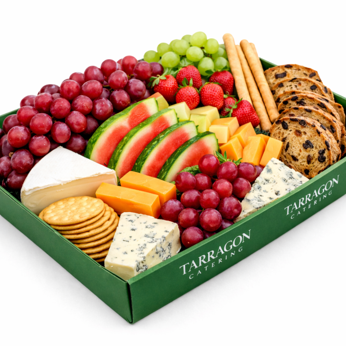 Cheese and Fruit Platter - Brie, Cheddar and Blue Cheese accompanied by fresh seasonal fruits, crisp water crackers, grissini, fruit bread. 