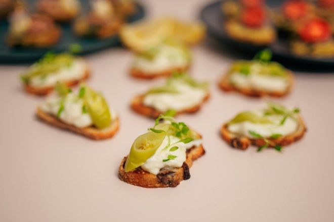 Olive Bread Crostini stracciatella, spanish guindillas, fig jam v / nf