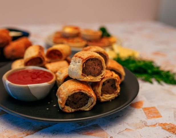Our Signature Beef Sausage Rolls w tomato sauce nf