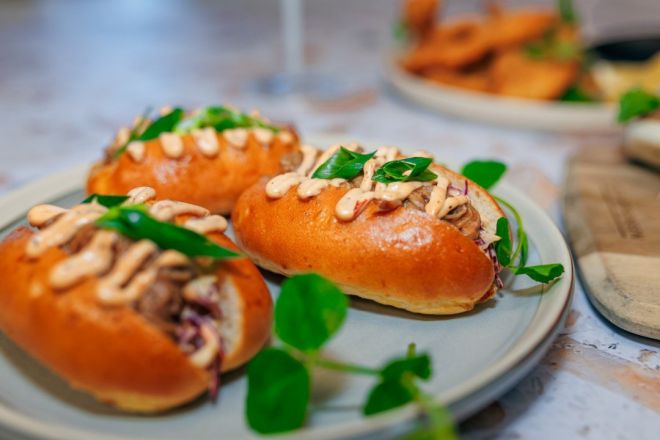 Texas BBQ Rubbed Pulled Beef Brisket, coleslaw, chipotle mayo mini roll nf