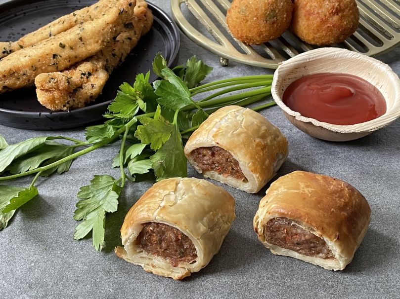 Our Signature Beef Sausage Rolls w tomato sauce nf