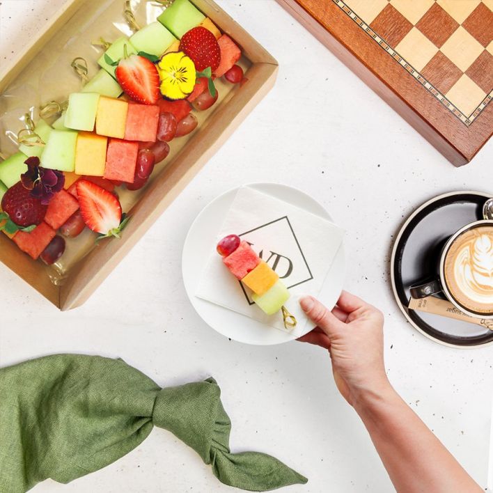 Box of seasonal fruit skewers including watermelon, rockmelon, honeydew & grape