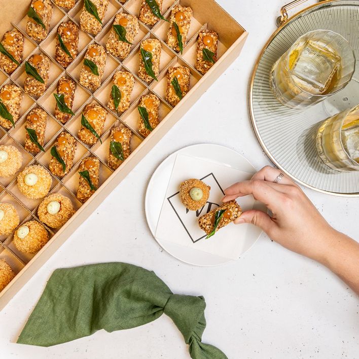 Box of hot bite-sized canapés 