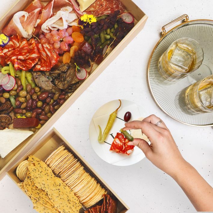 Boxed Grazing platter with continental meats, vegetables, nuts, cheeses & crackers